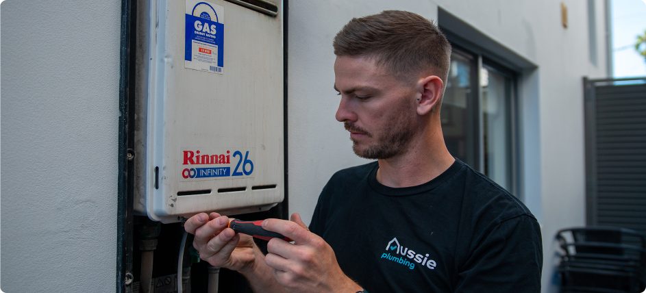 aussie service worker fixing hot water